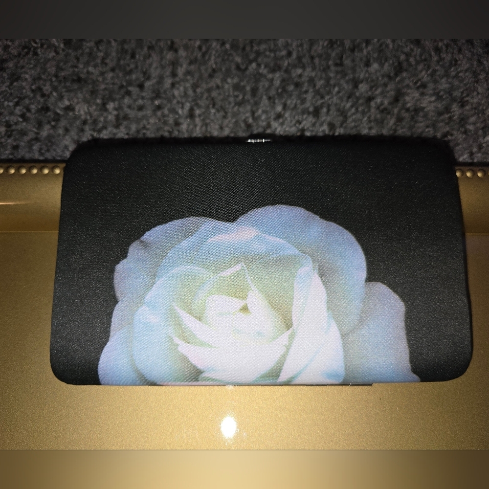 Floral Black Clutch By Harold Feinstein